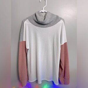 Women’s cowl neck sweater blouse.